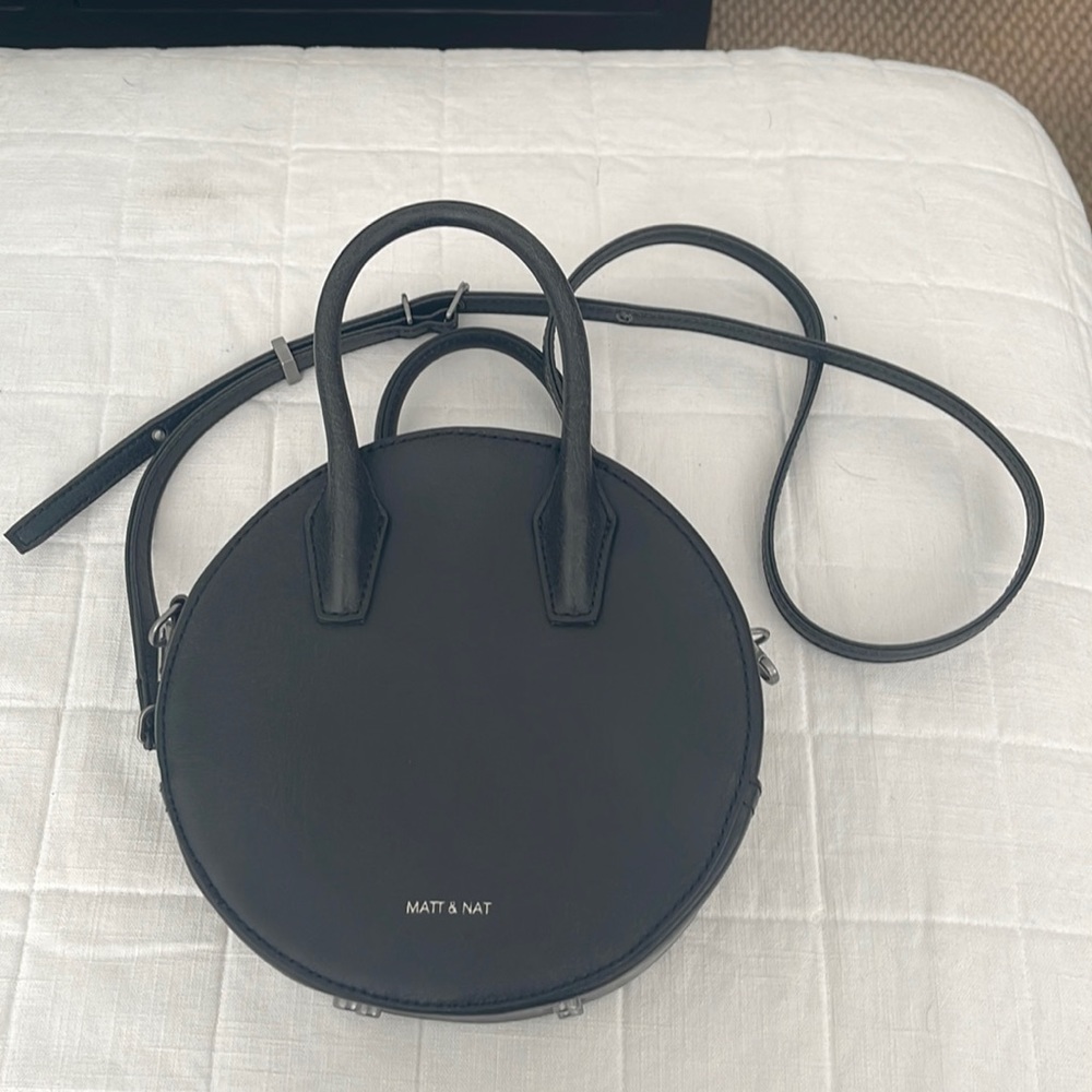 COPY - This is a Mat & Nat black crossbody purse with a long strap.